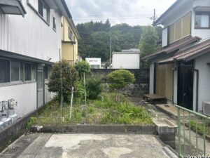 物件の外、家庭菜園スペースの写真です。