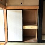押入